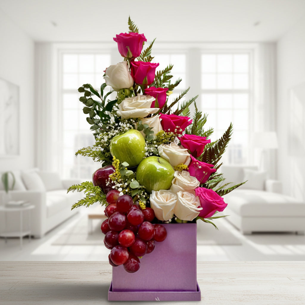 Gift box with pink and white roses, green apples, and red grapes in lilac box – Arboletes delivery