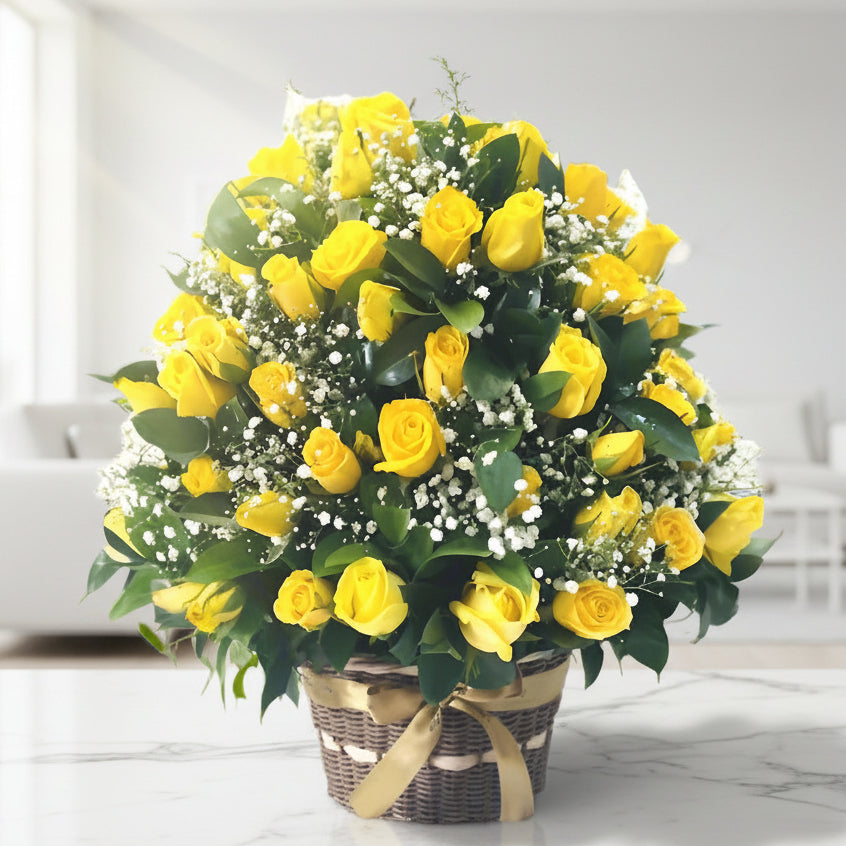 Gorgeous wicker basket filled with 100 yellow roses