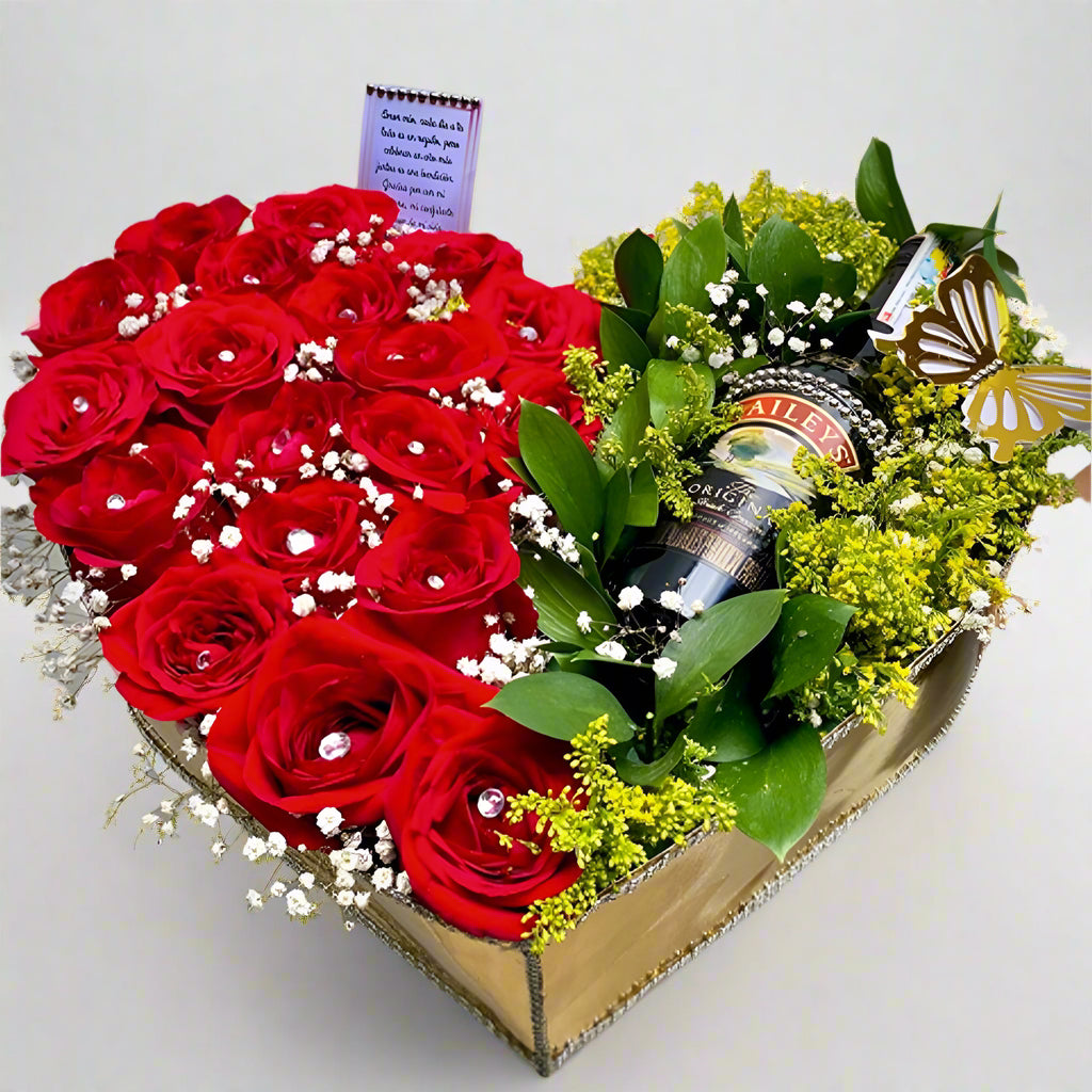 Heart-shaped arrangement of red roses with a bottle of wine and decorative elements on a white background, Arboletes Antioquia