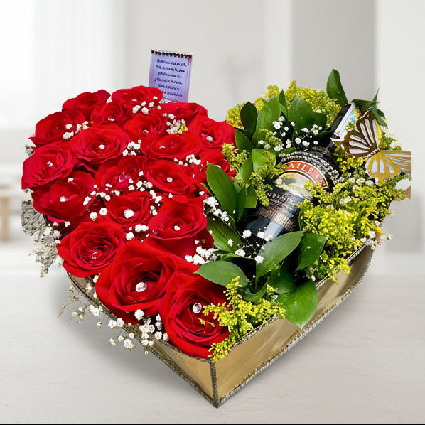 Heart-shaped arrangement of red roses with a bottle of wine and decorative elements on a white background, Arboletes Antioquia