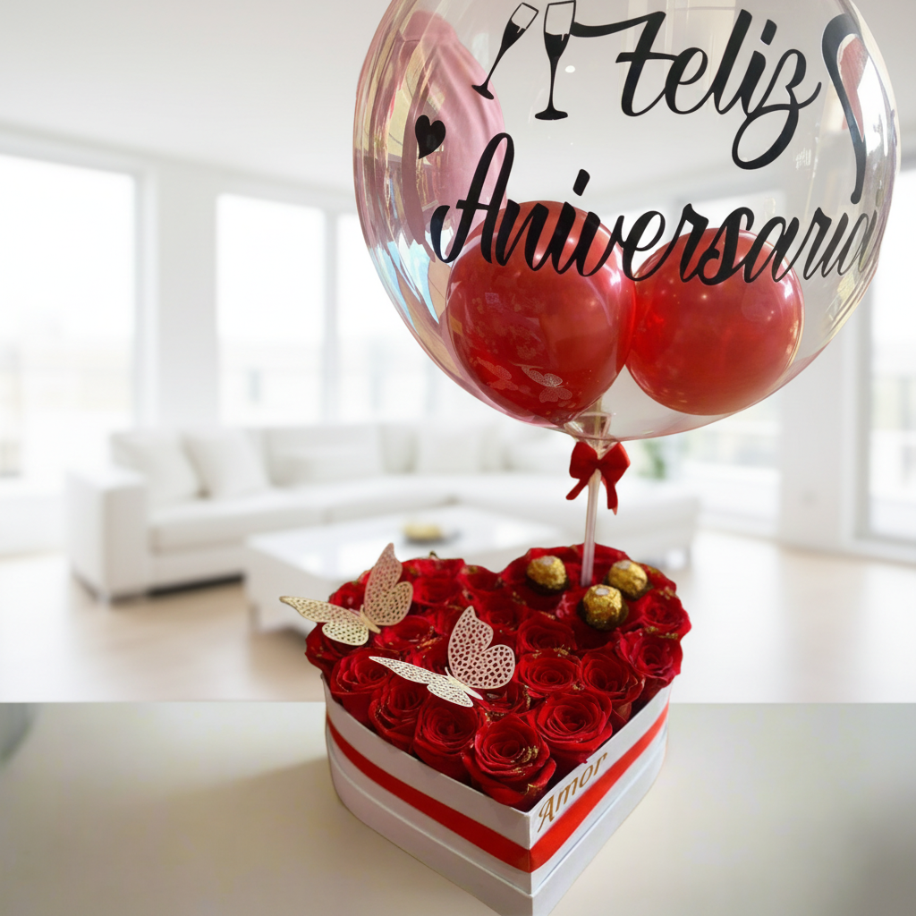 Heart-shaped box with red roses, Ferrero chocolates, butterflies, and “Happy Anniversary” balloon – Acacías, Meta