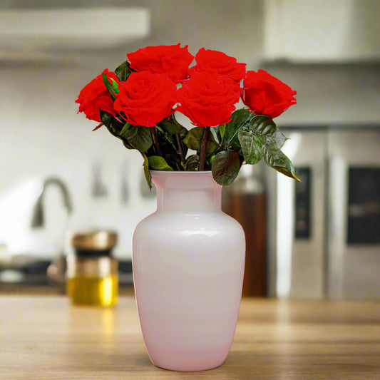 Luxury white vase with 6 premium red roses, perfect for sophisticated gifting in Bogota.