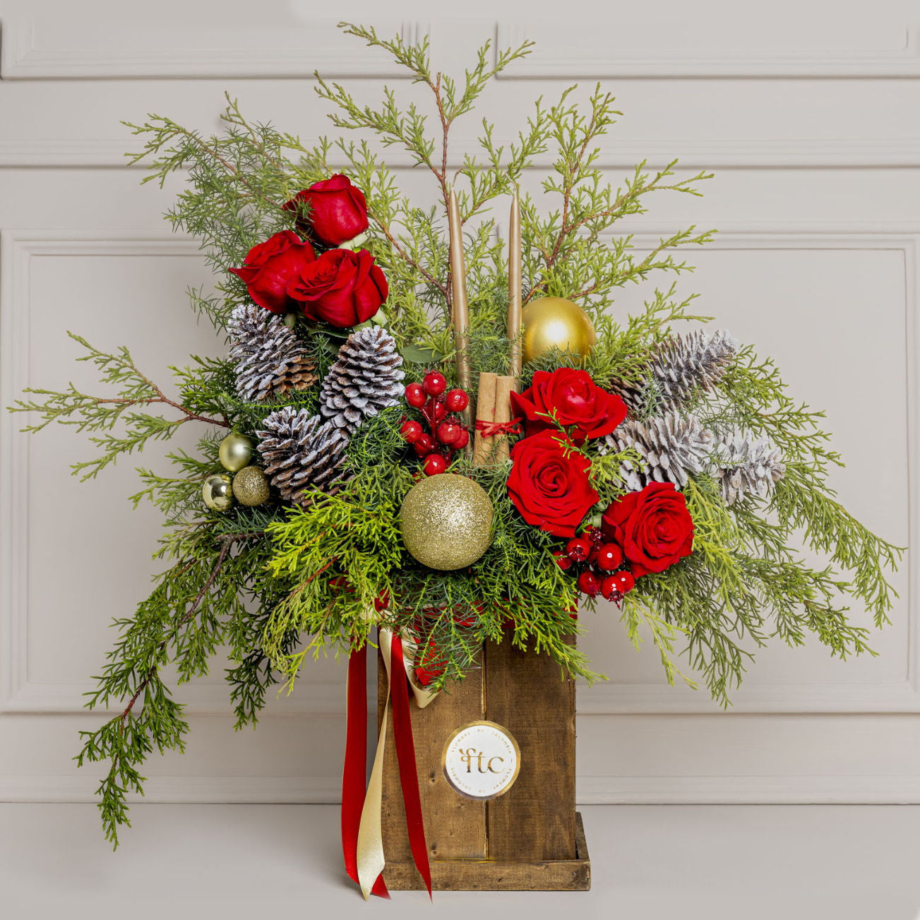 Elegant Christmas Arrangement with Red Roses, Pine, Snowy Cones & Metallic Candles – Medellín Delivery