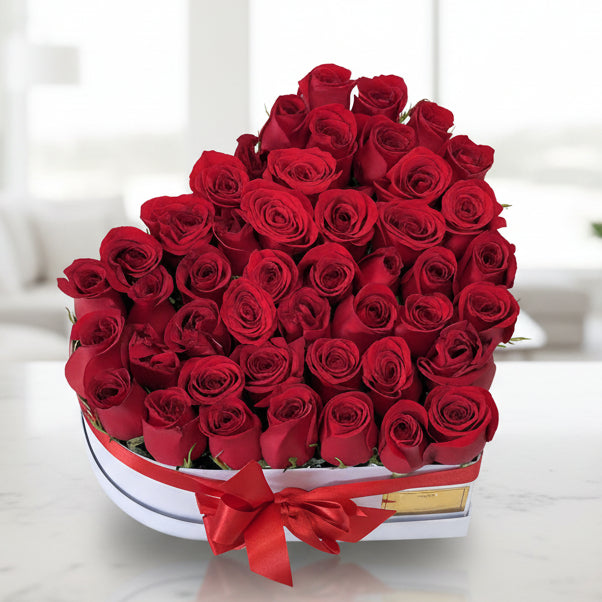 Luxurious heart arrangement with 45 red roses to Medellin in Colombia