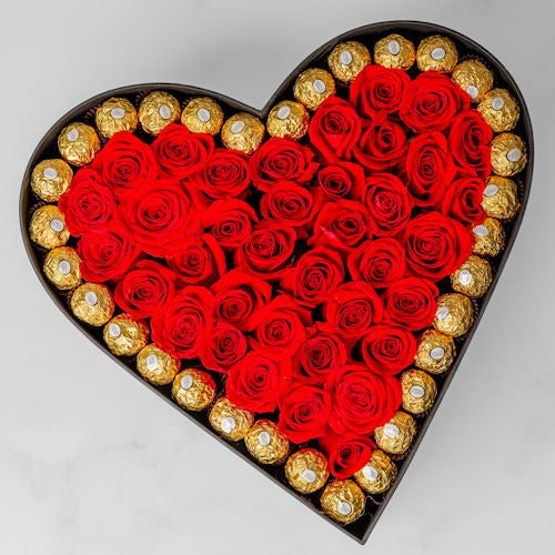 Luxury black box with over 80 golden and red roses, including a love-themed topper