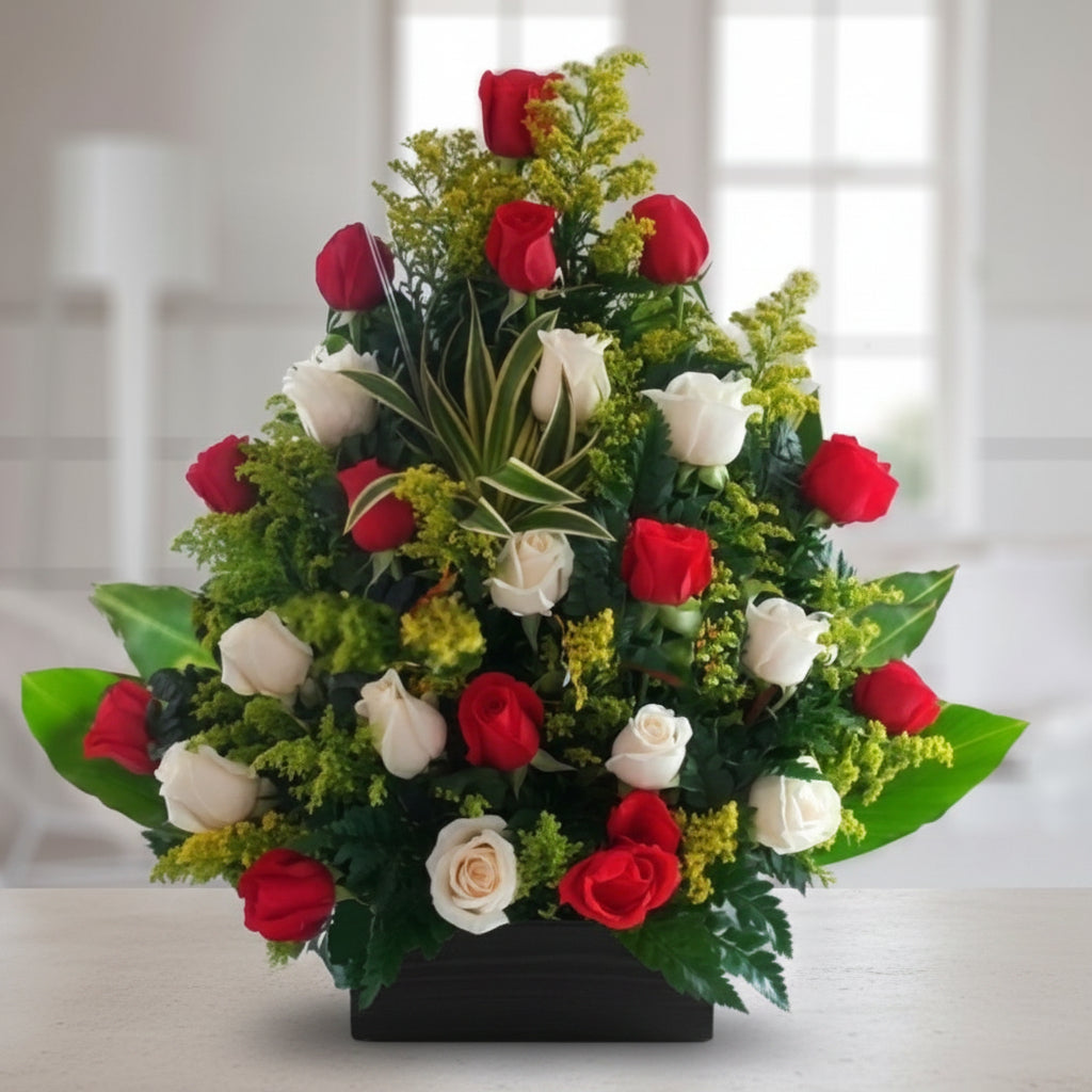 Two dozen red and white roses in a wooden vase, available for delivery in Bogotá, Medellín, and Cali