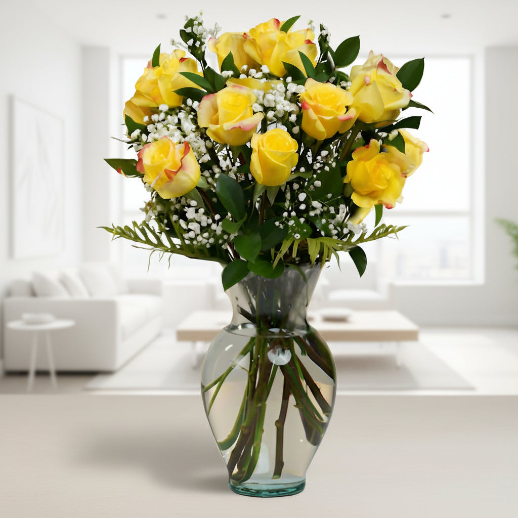 Radiant bouquet of 12 to 36 yellow roses in a transparent vase, symbolizing joy and friendship.