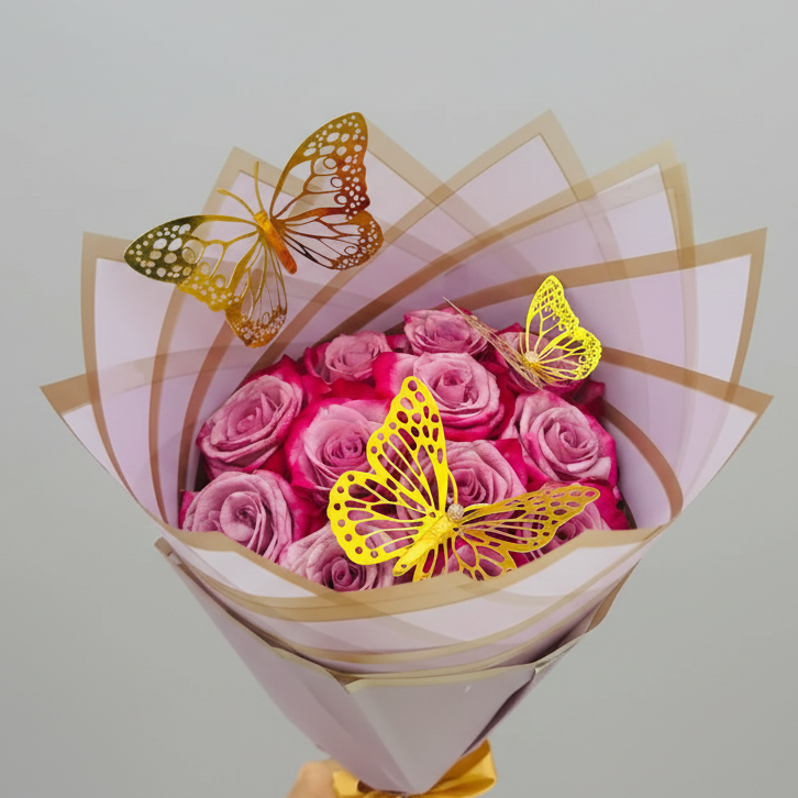 Elegant bouquet of 12 pink roses decorated with large and small butterfly accents, wrapped in premium Korean-style paper, perfect for romantic and special occasions.