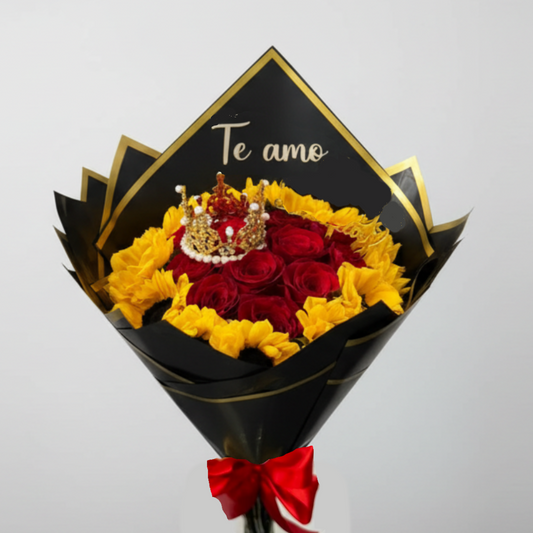 Bouquet of 12 roses and sunflowers wrapped in black and gold floral paper with a red bow and “Te amo” message.