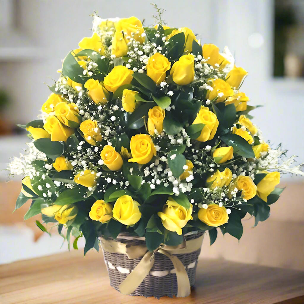 Gorgeous wicker basket filled with 100 yellow roses