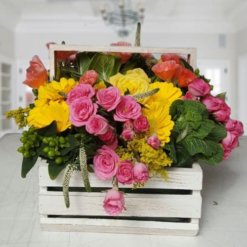 Basket of yellow & pink roses