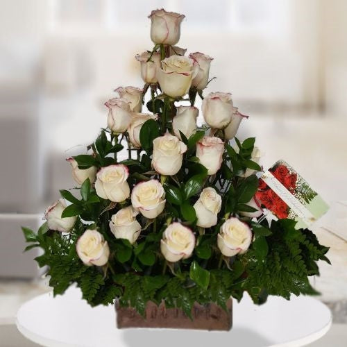 White roses in vase