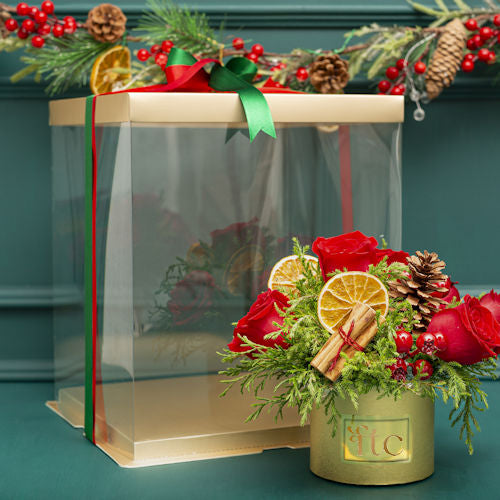 Elegant Christmas Centerpiece with Red Roses and Festive Accents