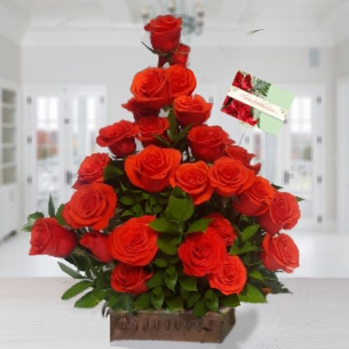 24 roses in wooden vase for delivery to Bogotá
