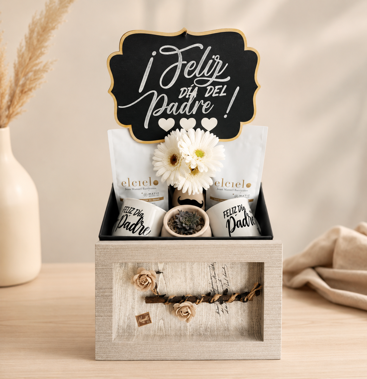 Luxury coffee gift basket in Pereira featuring specialty coffee, ceramic mugs, floral arrangement, coffee cookies, succulent plant, and elegant gift packaging.