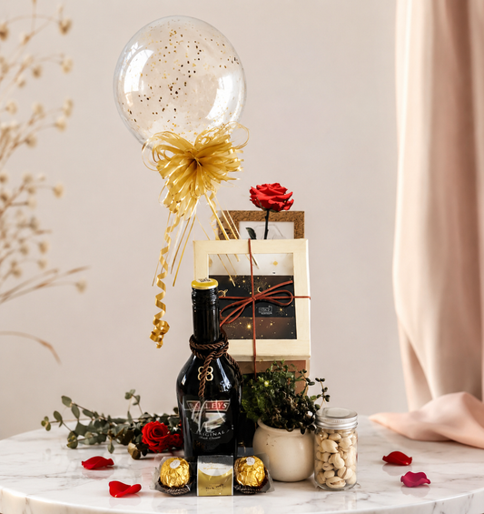 Luxury coffee gift basket in Pereira with specialty coffee, ceramic mugs, floral arrangement, cookies, succulent plant, and elegant gift box.
