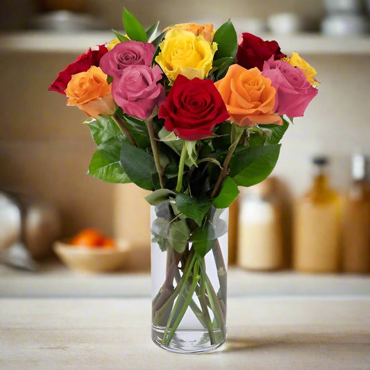 Dozen mixed color roses in a vase, available for delivery to all cities in Colombia
