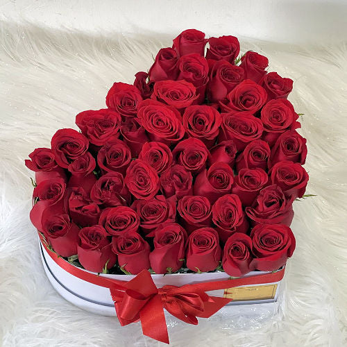 Luxurious heart arrangement with 45 red roses to Medellin in Colombia