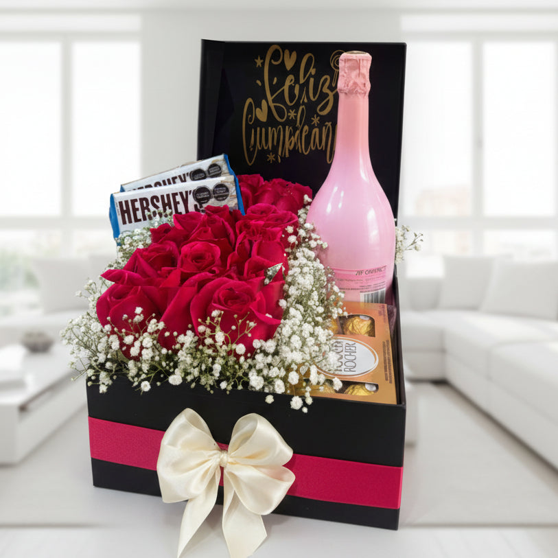 Luxury red roses gift box with sparkling rosé bottle, Ferrero Rocher and Hershey bars, birthday gift delivery in Bucaramanga