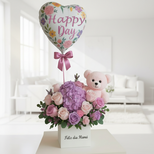 Mother’s Day flower arrangement with pink roses, hydrangea, teddy bear and heart-shaped balloon in Cali Colombia
