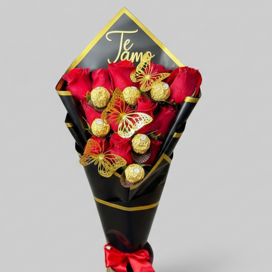 Bouquet of red roses with Ferrero Rocher chocolates and decorative golden butterflies, wrapped in black and gold paper with “Te amo” message, available for delivery in Medellín, Colombia.