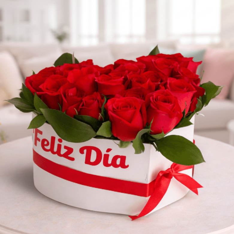 heart-shaped box with red roses and feliz dia message for delivery in Cali Colombia