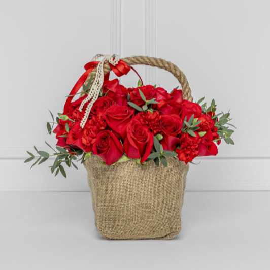 Red Roses in Natural Fiber Basket | Flower Delivery Medellín