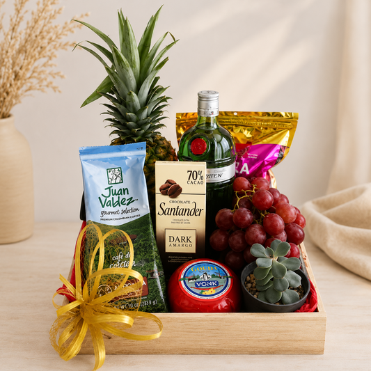 Luxury Tanqueray gin gift basket in Pereira featuring Tanqueray gin, Juan Valdez coffee, Dutch cheese, dark chocolate, fresh fruit, succulent plant, and gourmet snacks.